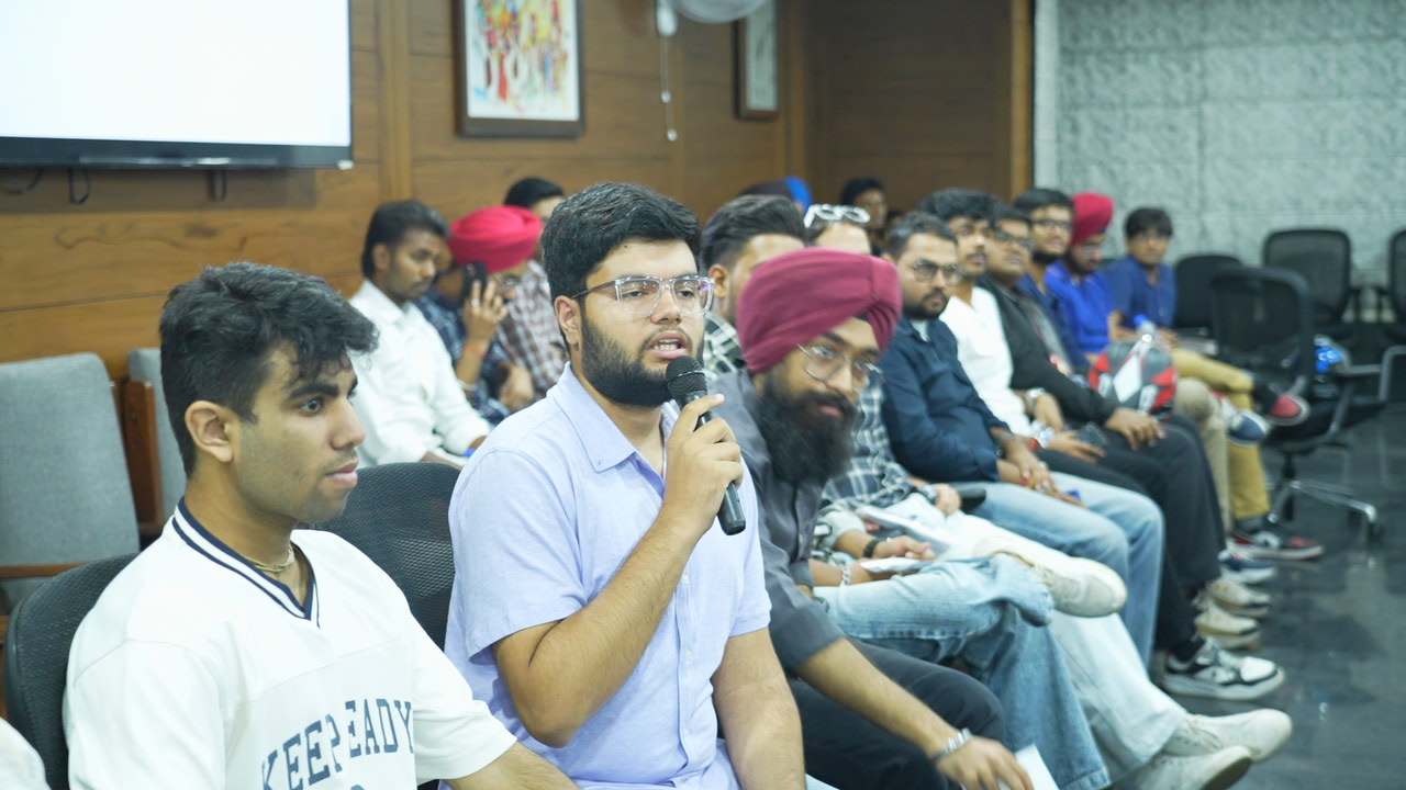 Young cybersecurity professionals engaging in Q&A session at Hacker Meetup India