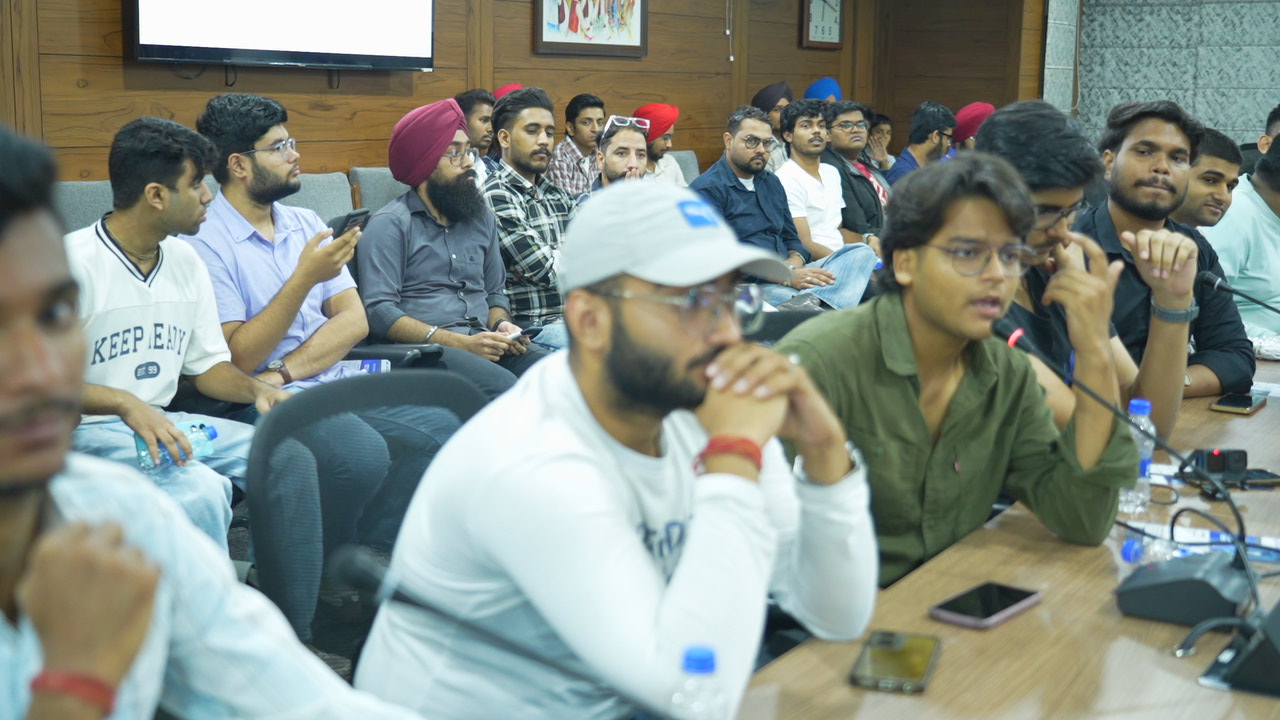 Technical presentation with officials and attendees at ethical hacking meetup